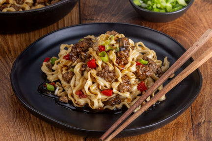 Spicy Beef Noodles and chop sticks.