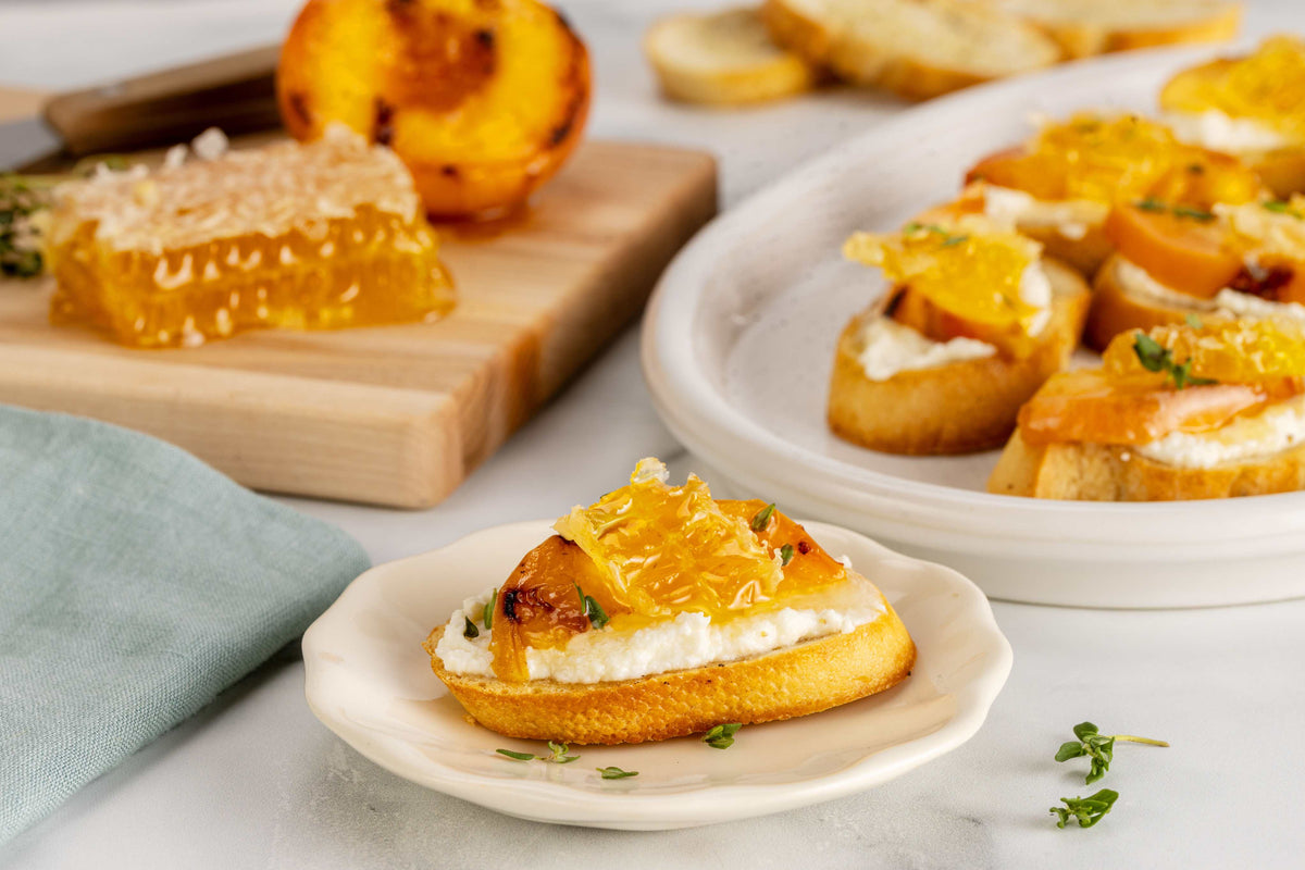 Peach crostini with honyecomb
