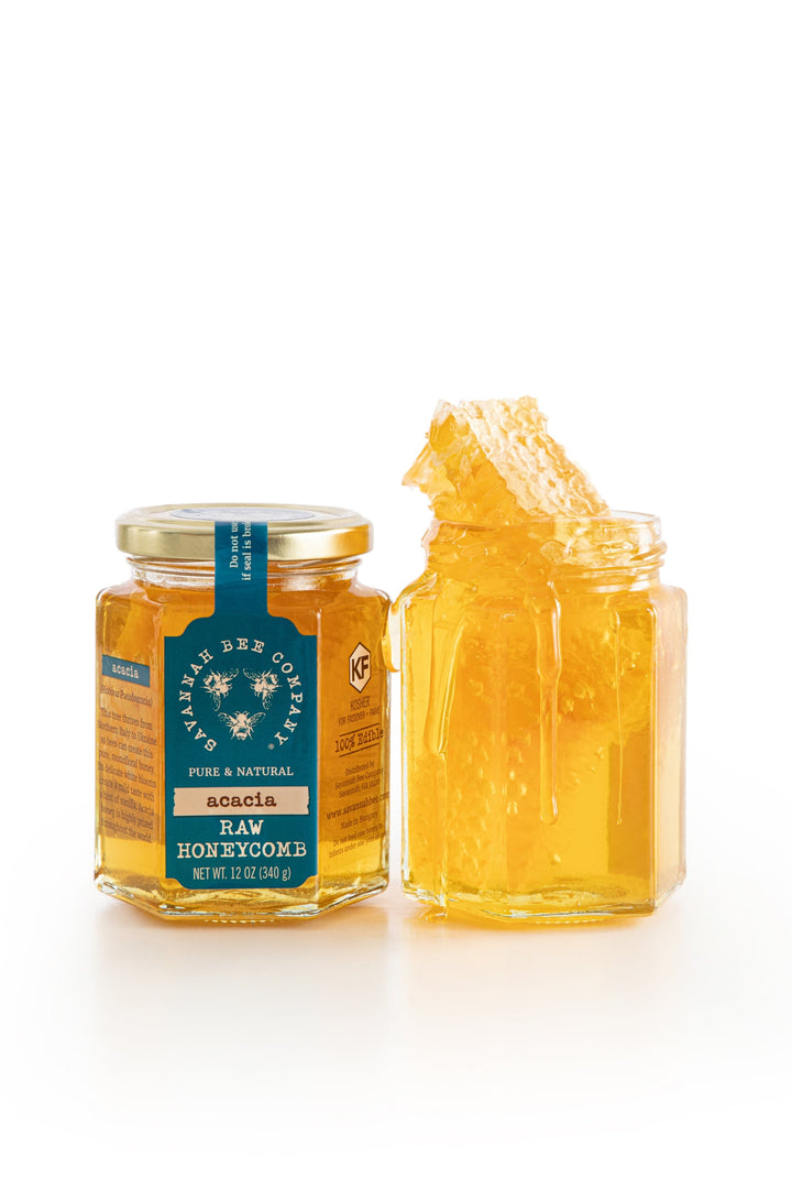 Pure & Natural Acacia Raw Honeycomb in a 12 oz jar with a golden lid.